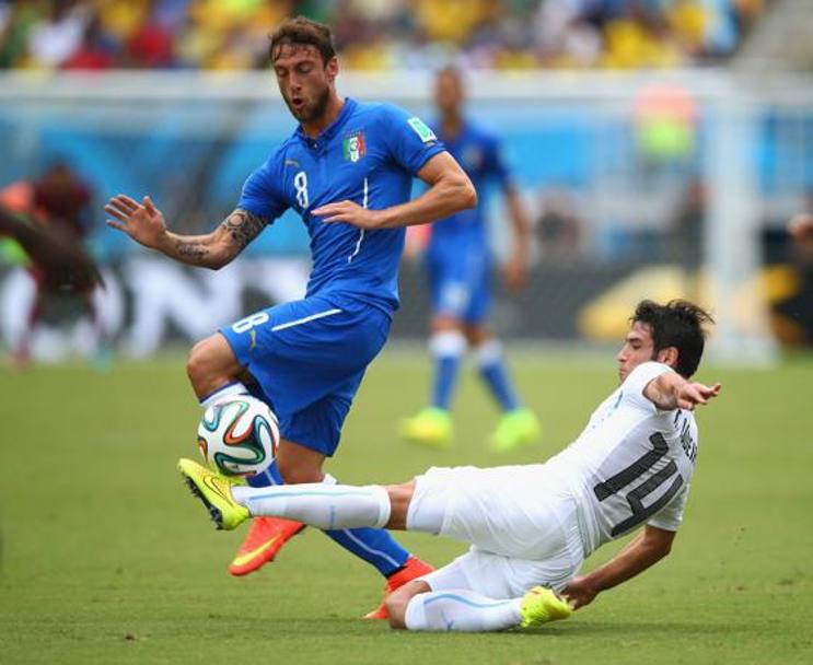 Lodeiro cerca di frenare la corsa di Marchisio. Getty Images